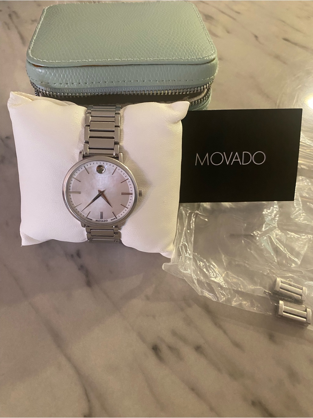 Movado Silver Watch With White MotherOfPearl Dial